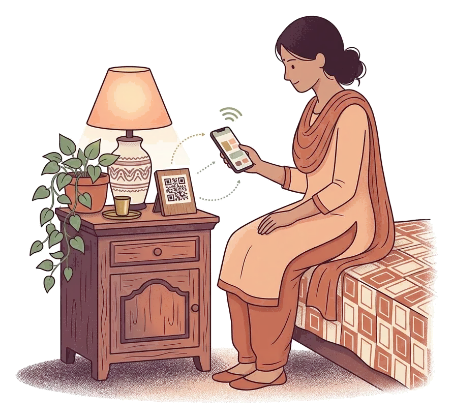 Phone scanning a QR card on a bedside table